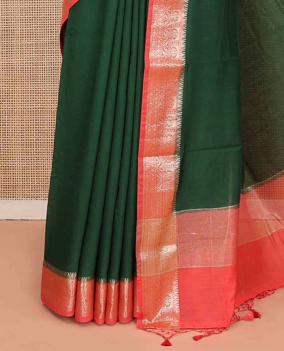 Green Plain Assam Silk Saree, Complemented by Captivating Contrast Border Featuring Traditional Zari Designs, Gleaming Zari Woven Pallu, and Paired with a Contrast Blouse