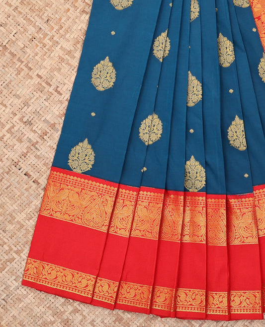 Blue Budget Silk Saree, Elevated with Zari Buttas All Over Its Body, Complemented by a Contrast Rettai Pettu Border of Traditional Motifs in Zari, Gracefully Embellished Pallu, and Paired with a Contrast Blouse