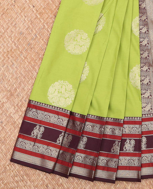Green Budget Silk Saree, Adorned with Round Zari Buttas All Over Its Body, Complemented by Captivating Contrast Border of Traditional Zari Designs, Grand Jaal Pallu, and Paired with a Contrast Blouse