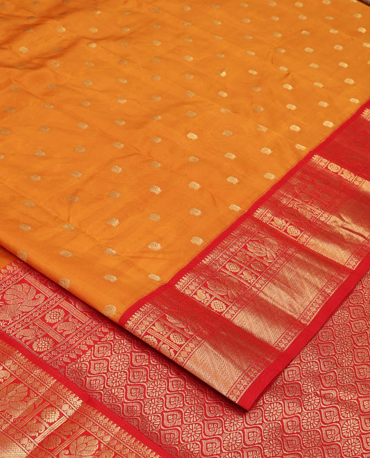 Orange peacock zari buttas Bangalore silk saree, contrast traditional zari border, and pallu of ogee patterns
