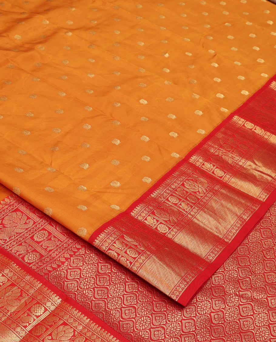 Orange peacock zari buttas Bangalore silk saree, contrast traditional zari border, and pallu of ogee patterns