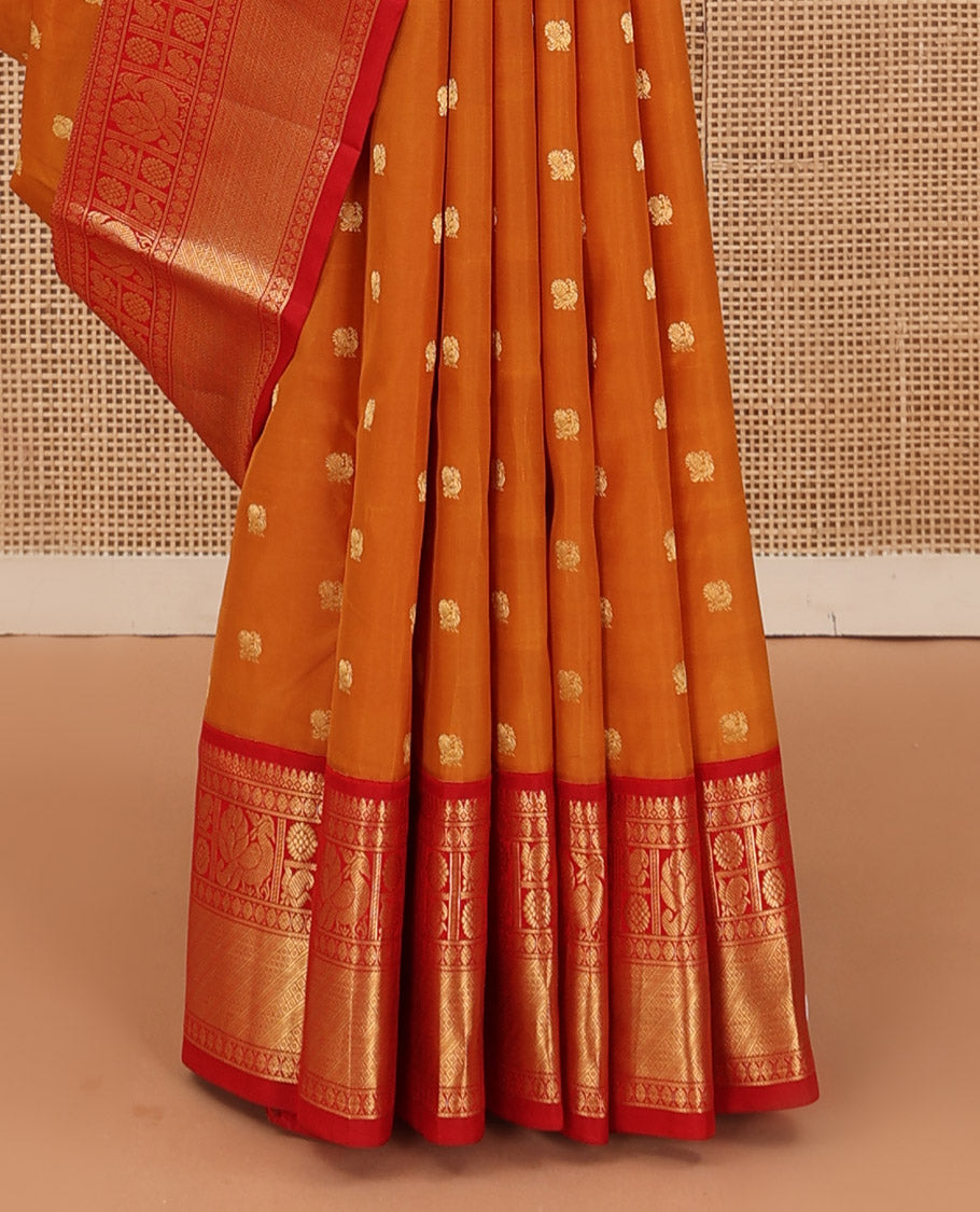 Orange peacock zari buttas Bangalore silk saree, contrast traditional zari border, and pallu of ogee patterns