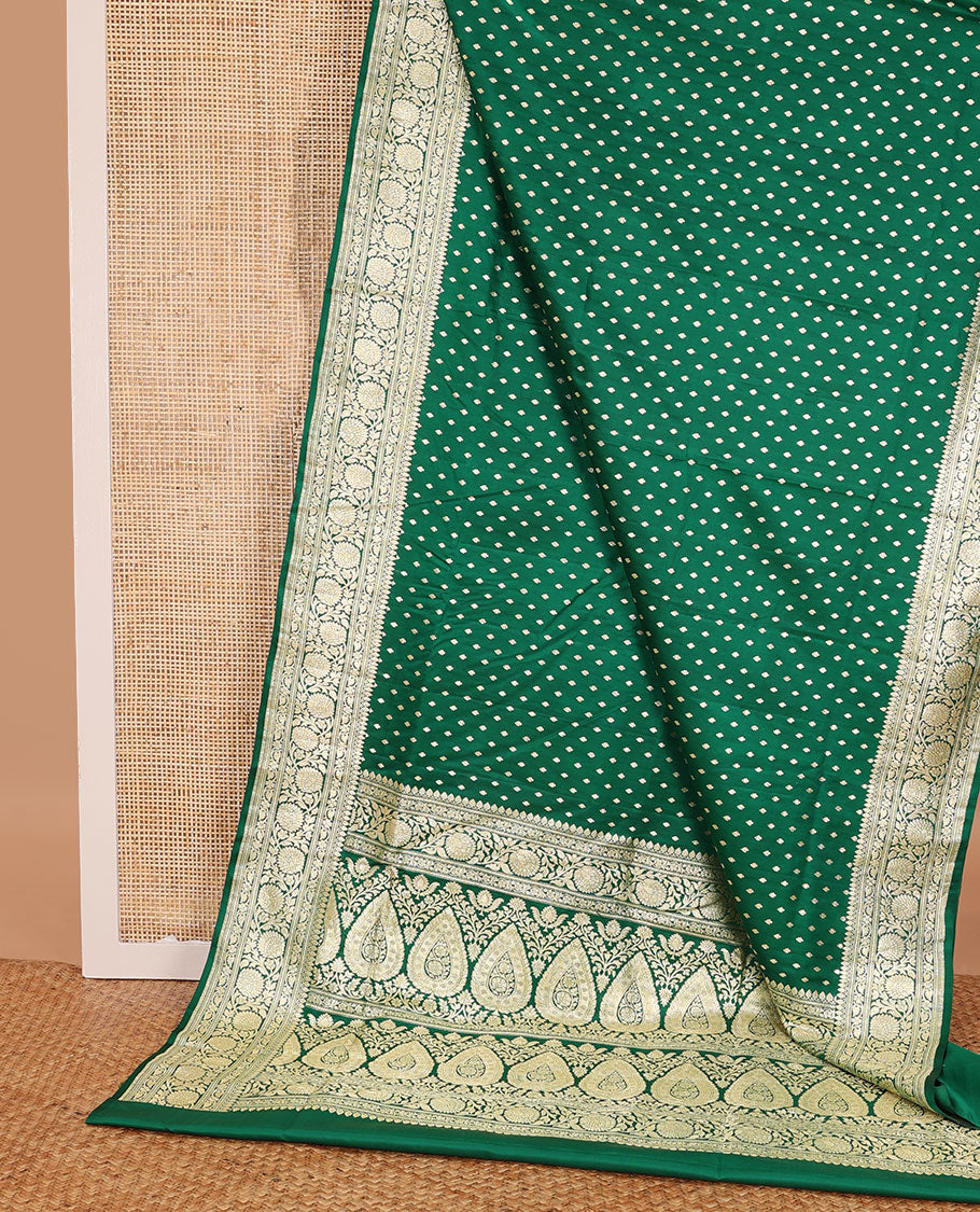 Green banarasi silk saree with zari buttas, zari border of floral creeper designs & zari-rich pallu of intricate floral designs
