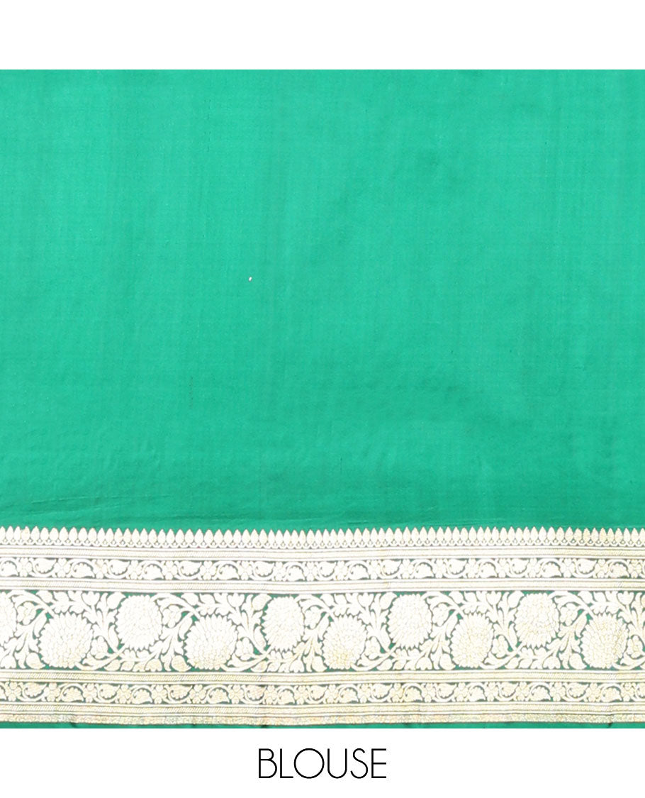 Green banarasi silk saree with zari buttas, zari border of floral creeper designs & zari-rich pallu of intricate floral designs