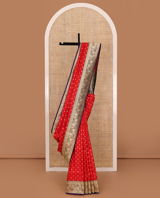 Red zari buttas banarasi silk saree, contrast traditional border of floral creeper design, and floral-paisley zari woven pallu