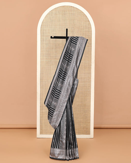 Black geometric jacquard satin silk saree, zari border and pallu steeped with traditional zari designs