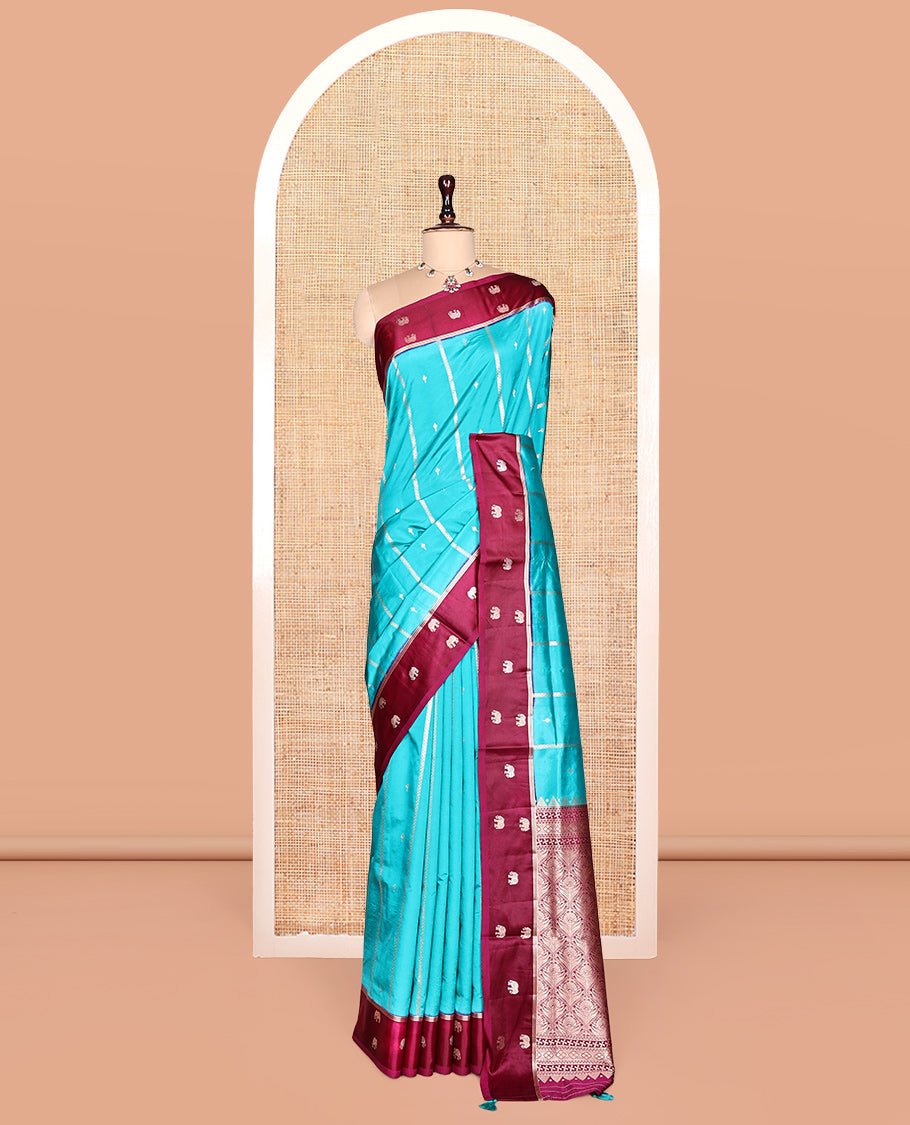 Blue Satin Silk Saree, Adorned with Buttas and Stripes, Complemented by a Contrast Elephant Motif Border,  Grand Jaal Pallu, and a Contrast Blouse