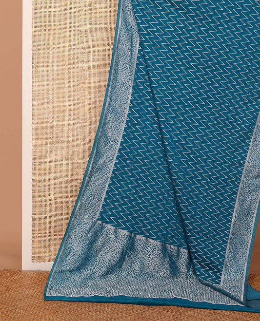 Blue chevron design fancy crepe saree, self-zari border & pallu of zari designs