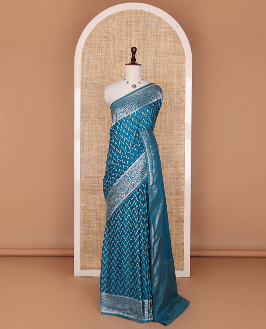 Blue chevron design fancy crepe saree, self-zari border & pallu of zari designs