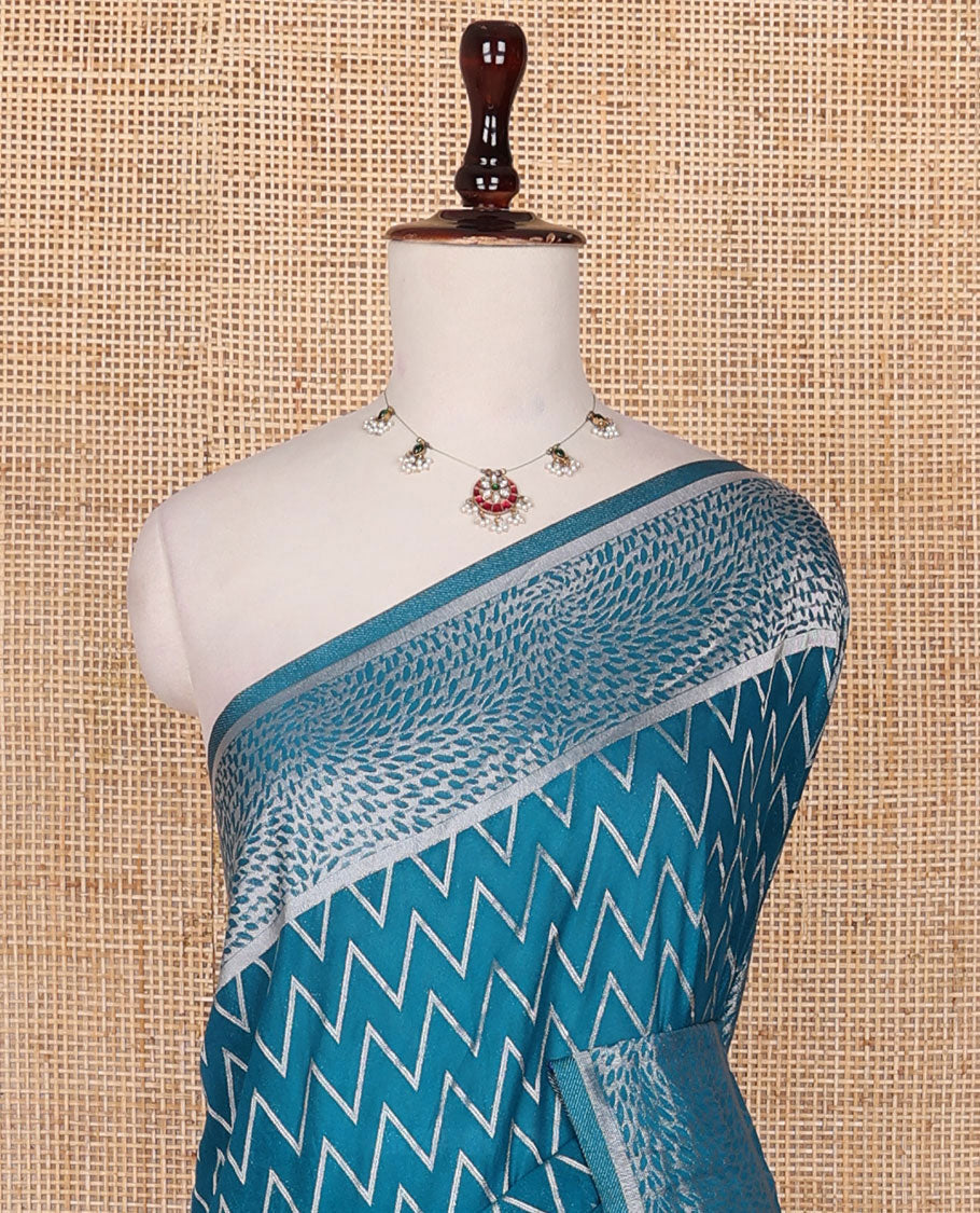Blue chevron design fancy crepe saree, self-zari border & pallu of zari designs