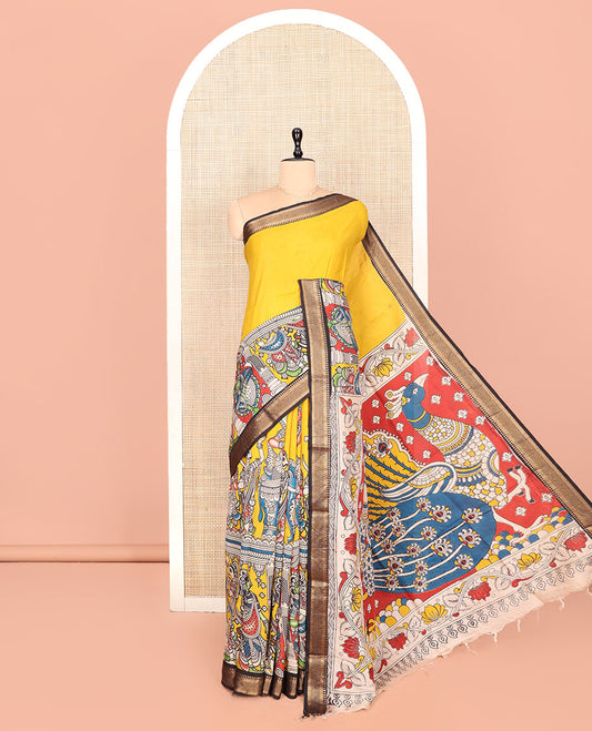 Yellow Kalamkari Cotton Saree, Adorned with Human Figurine Print, Contrast Traditional Zari Border, Peacock Pallu, and a Contrast Blouse