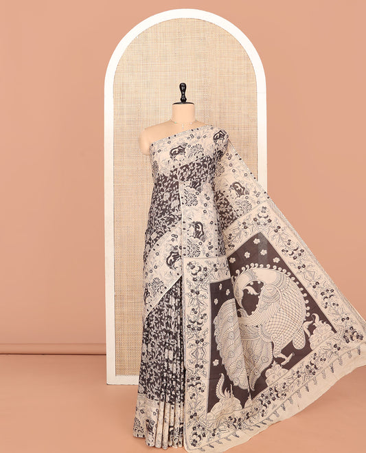 Black Machine Printed Kalamkari Cotton Saree Features a Floral Vine, Contrast Pichwai-Printed Border, Peacock-Printed Pallu, and a Matching Blouse