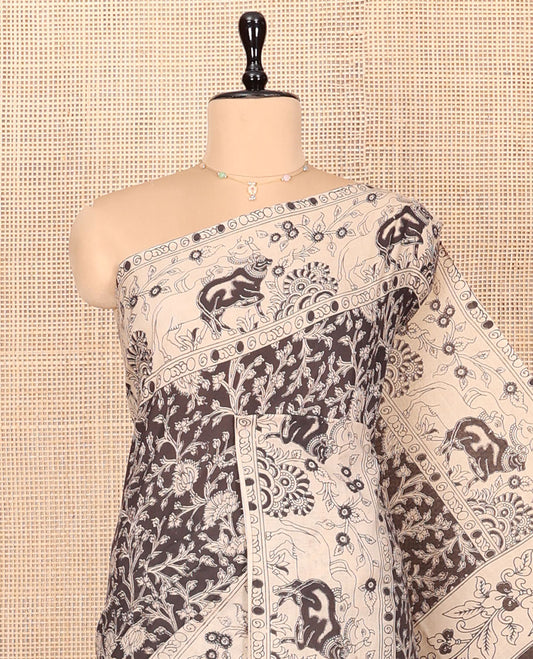 Black Machine Printed Kalamkari Cotton Saree Features a Floral Vine, Contrast Pichwai-Printed Border, Peacock-Printed Pallu, and a Matching Blouse