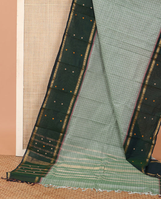 Green micro-checked Chettinad cotton saree, contrast thread and traditional zari border, and striped pallu