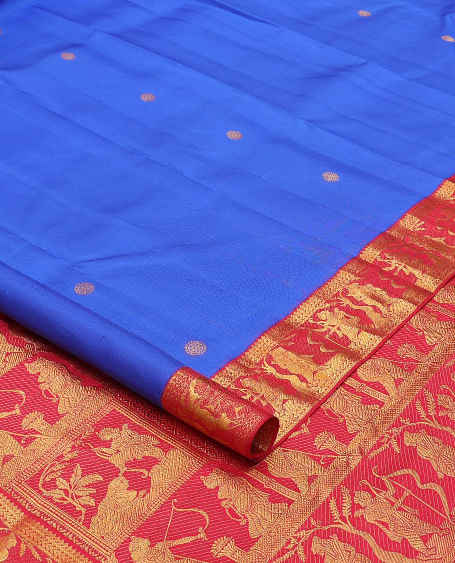 Royal blue chakram buttas Kanchipuram silk saree, contrast border of thilakam mokku,kathir, and Mythological characters, and pallu of Mythological motifs