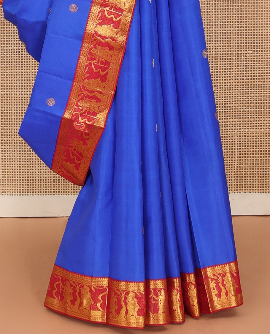 Royal blue chakram buttas Kanchipuram silk saree, contrast border of thilakam mokku,kathir, and Mythological characters, and pallu of Mythological motifs