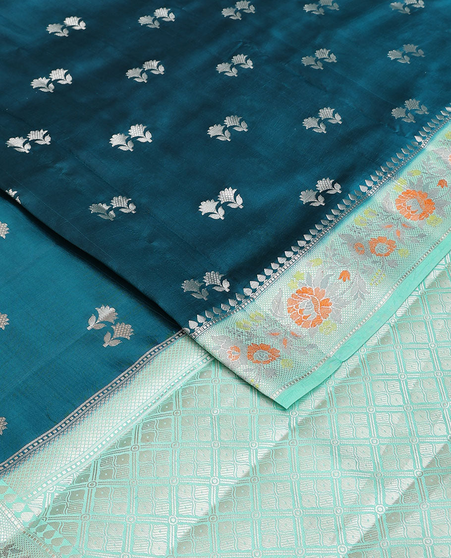 Blue raw mango silk saree with floral zari buttas, contrast border of meenakari zari floral designs & jaal pallu