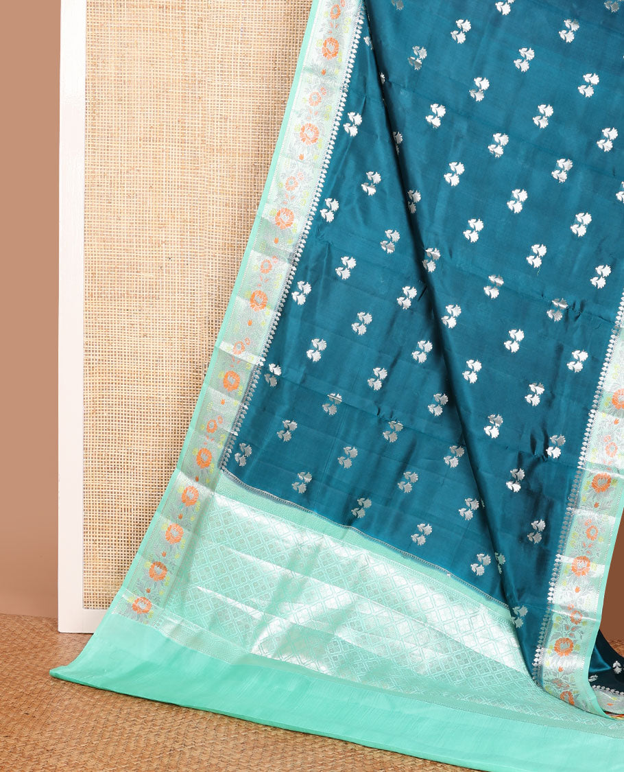 Blue raw mango silk saree with floral zari buttas, contrast border of meenakari zari floral designs & jaal pallu