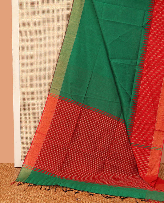 Green plain dupion saree, contrast zari striped temple border, and zari striped pallu