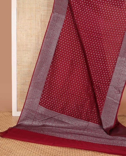 Maroon zari buttas fancy saree, zari floral creeper border, and floral jaal pallu
