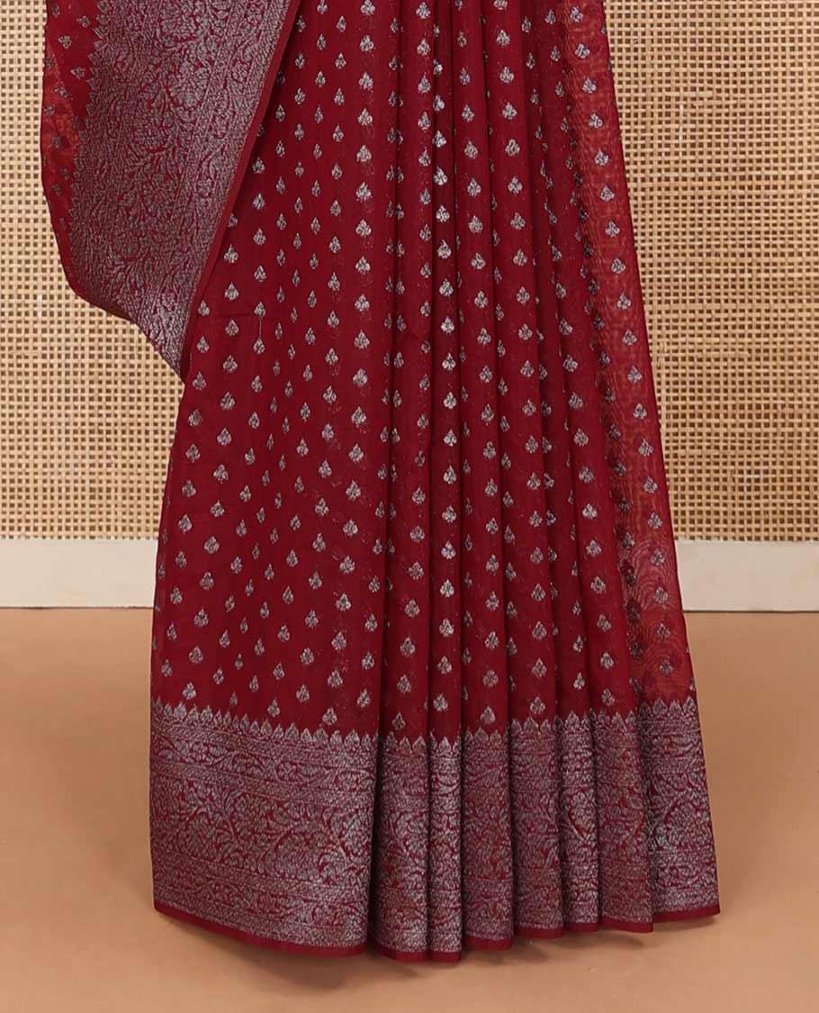 Maroon zari buttas fancy saree, zari floral creeper border, and floral jaal pallu
