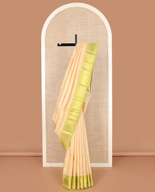 Sandal zari buttas Kanchipuram silk saree, contrast one-sided border of paneer sombu, banaras, and jaal designs, and pallu of floral designs