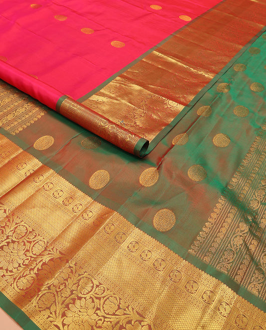 Red zari buttas Kanchipuram silk saree, contrast border of thilakam mokku, muthu, rudraksham, mayil, mayil kann, and kodi visiry designs, and chakram design pallu