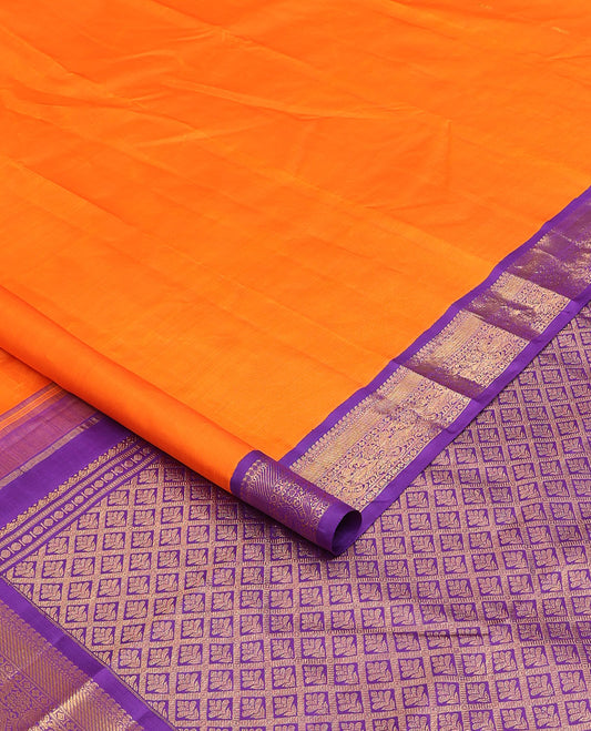 Orange zari buttas Kanchipuram silk saree, contrast korvai border of manga mokku, muthu, diamond, lavangam, and mayil design, and jaal pallu