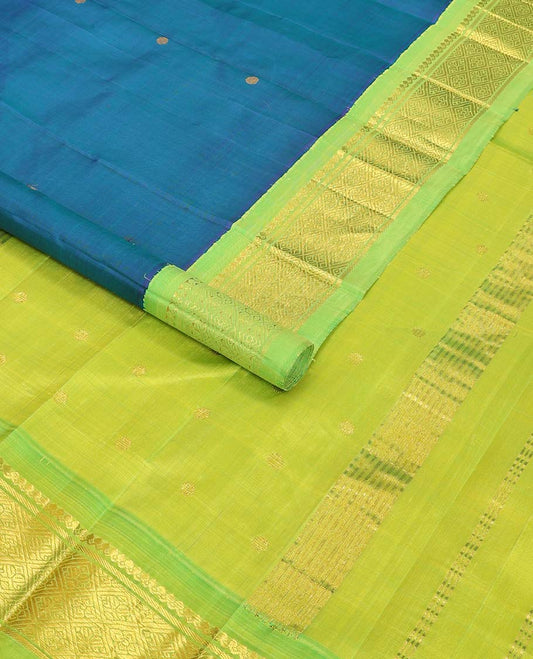 Blue round buttas kancheepuram silk saree with contrast korvai border of thilakam mokku, banaras design & zari design pallu