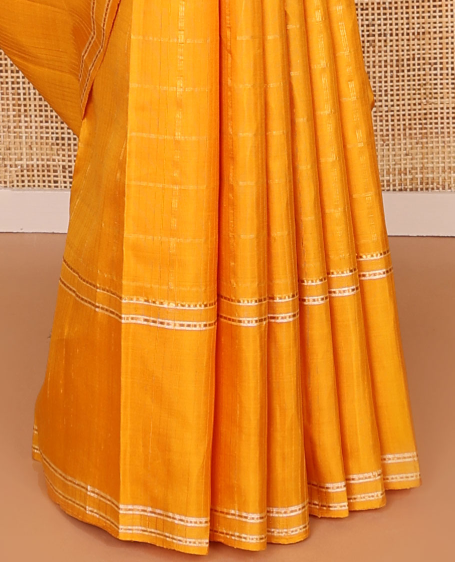 Orange checked kancheepuram silk saree with self zari border