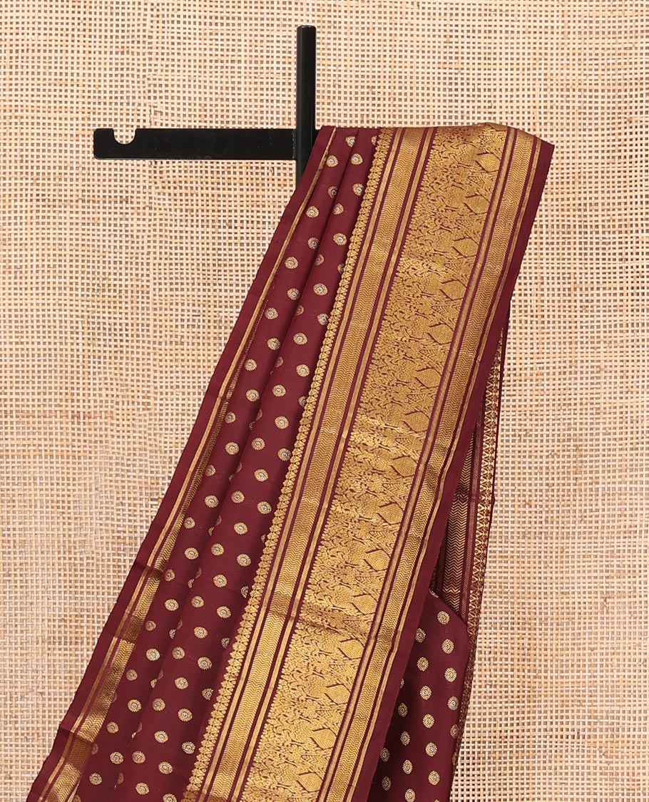 Maroon chakram buttas Kanchipuram silk saree, zari border of banaras,vanki & iru thalai pakshi & pallu of kathir,kamalam,mayil,yaanai,manga & iruthalai pakshi
