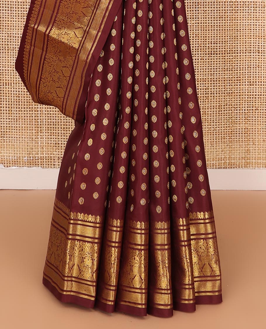 Maroon chakram buttas Kanchipuram silk saree, zari border of banaras,vanki & iru thalai pakshi & pallu of kathir,kamalam,mayil,yaanai,manga & iruthalai pakshi