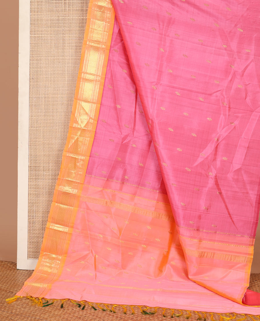 Pink zari buttas Kanchipuram silk saree, contrast one-sided border of panner sombu, banaras, diamond, and paisa designs, and zari design pallu