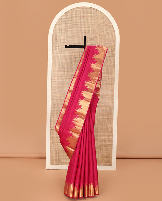 Red plain Kanchipuram silk saree, thazampoo rekku zari border, and pallu of mayil kann