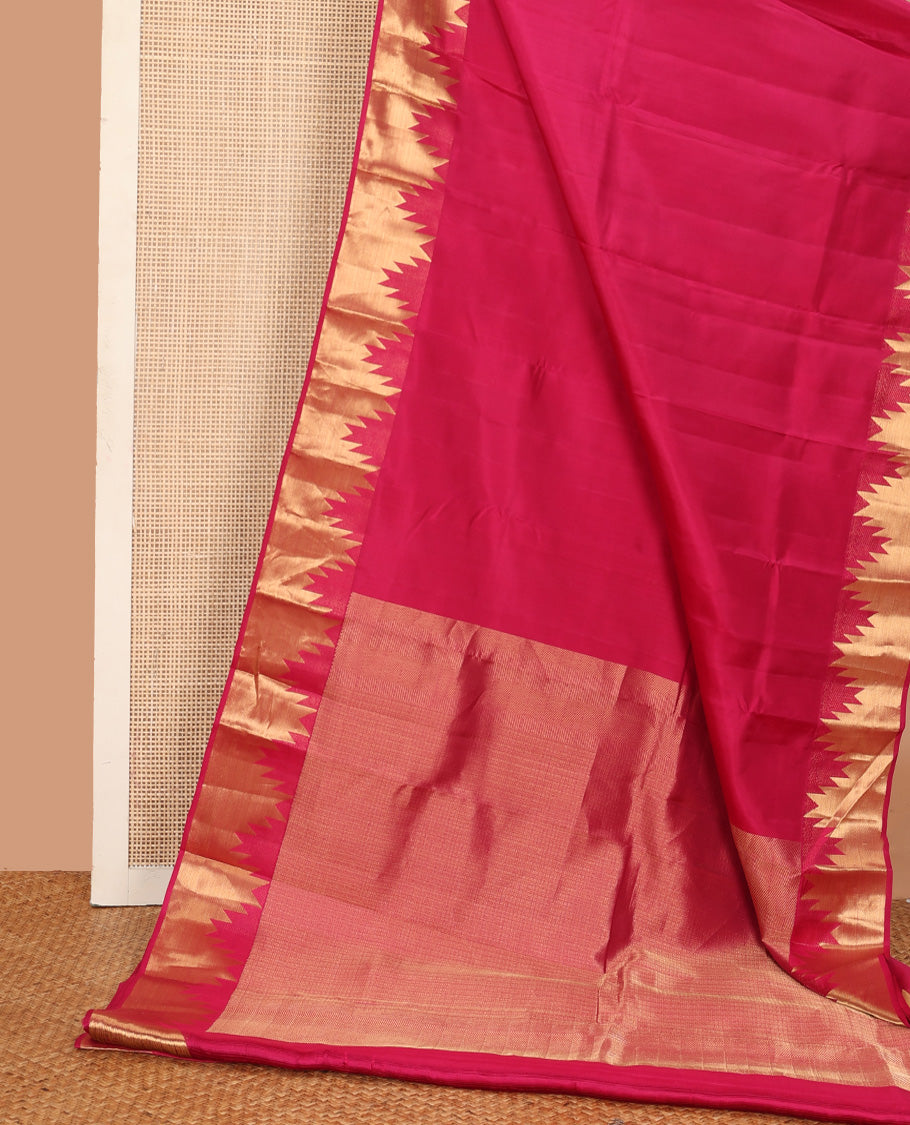 Red plain Kanchipuram silk saree, thazampoo rekku zari border, and pallu of mayil kann
