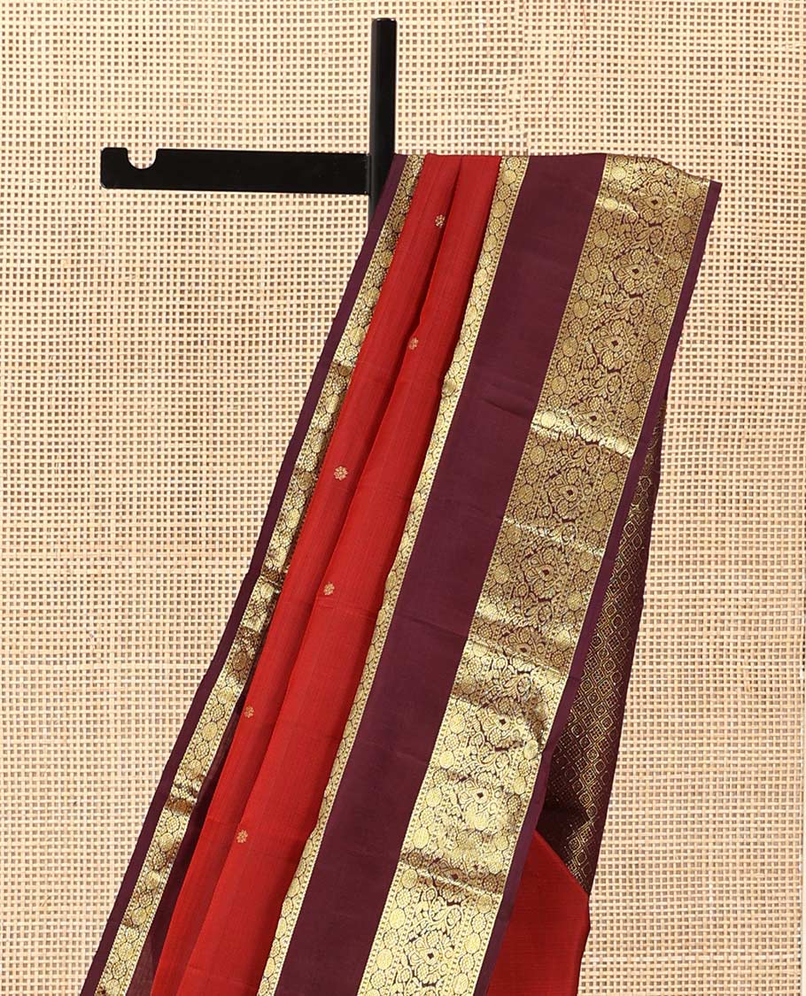 Red zari buttas Kanchipuram silk saree, contrast border of manga mokku, poun, laddu kamalam, and zari designs, and jaal pallu