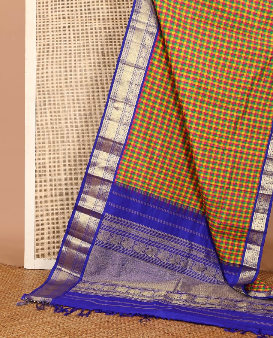 Multi-color paalum pazhamum checked Kanchipuram silk saree, contrast korvai border of manga mokku, kathir, muthu, mayil, and jaal design, and jaal pallu