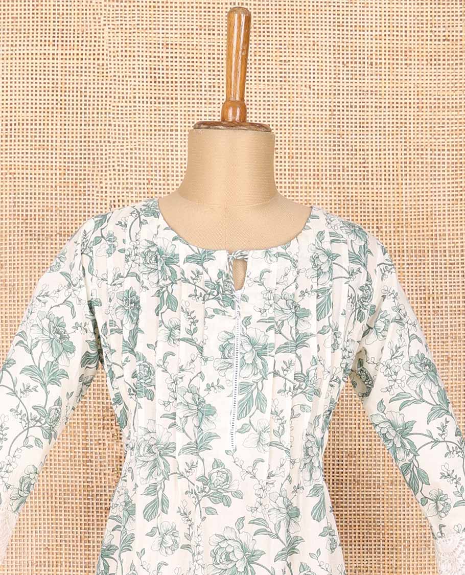 White floral design with lace border round neck, 3/4 th sleeve, below knee kurti