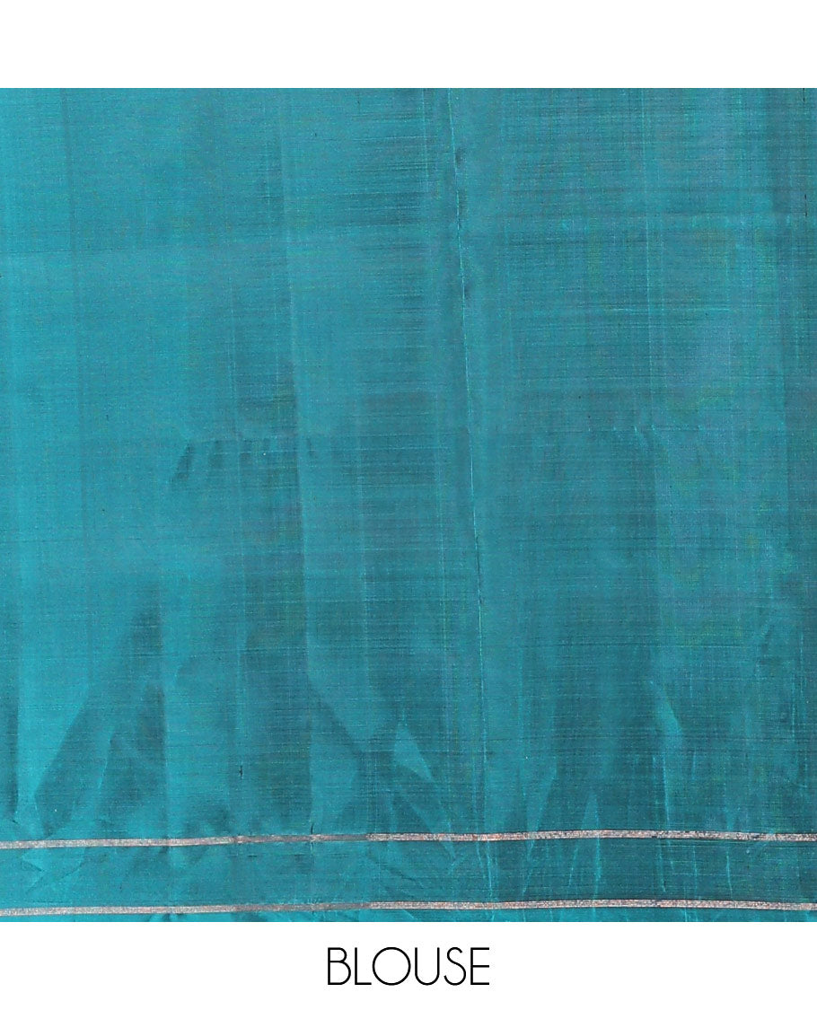 Peacock blue annam chakram buttas soft silk saree, zari piping border, and zari striped pallu