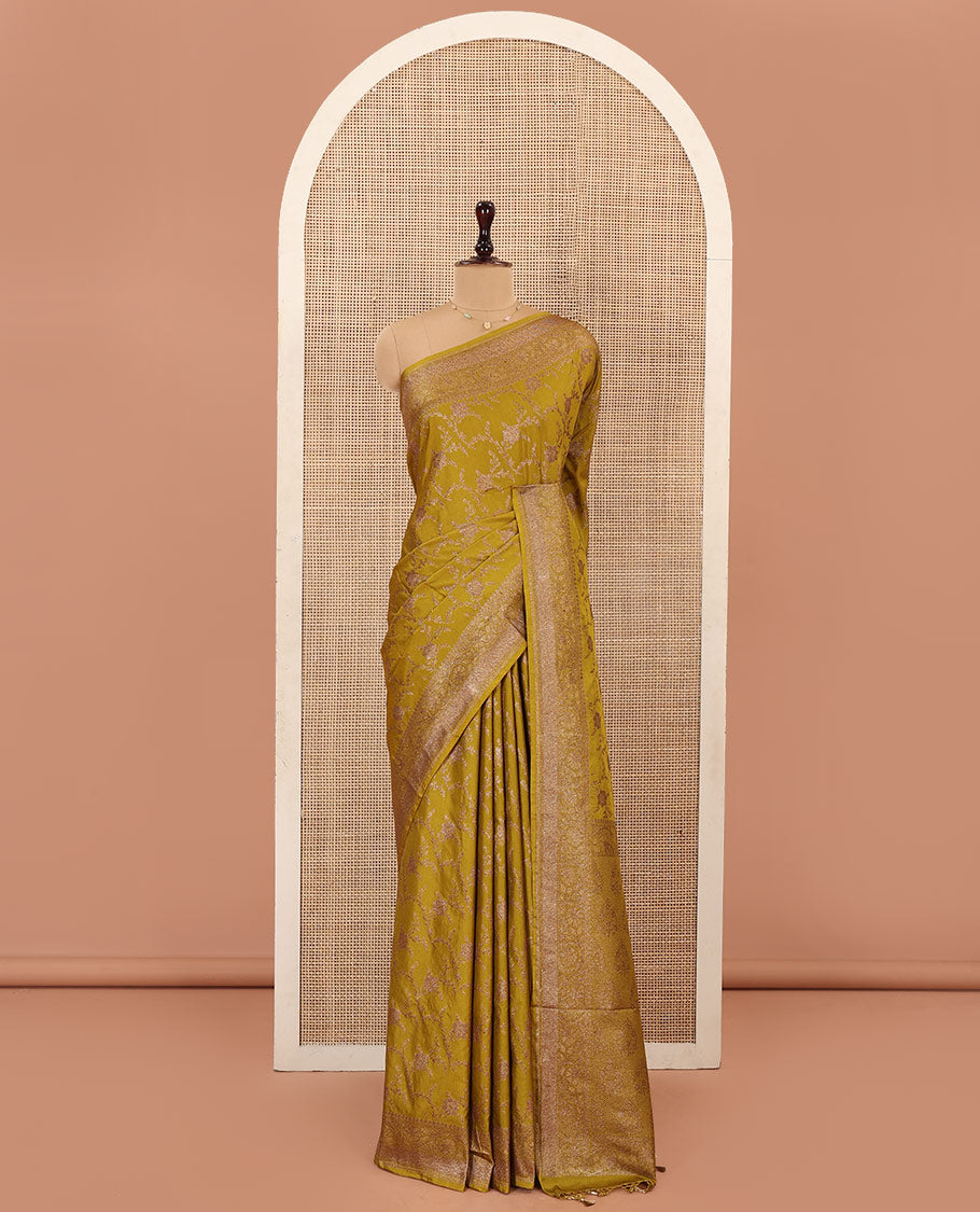 Green Mushru Silk Saree, Elegantly Woven with Floral Jaal Jacquard on Its Body, Sparsely Sparkled Zari Border, Mughal-Style Woven Pallu of Floral Bouquets, and Paired with a Matching Blouse