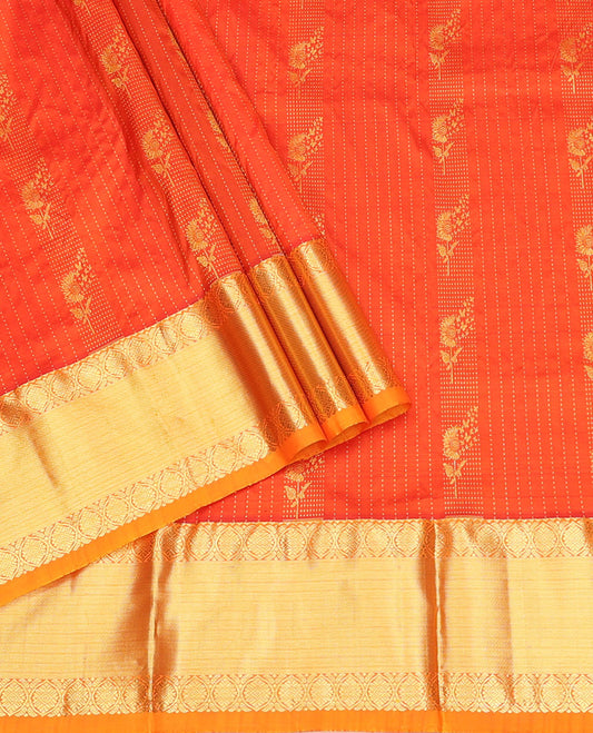 Orange Pure Silk Material Half Saree, Embellished with Zari Stripes and Zari Buttas Skirt, a Contrast Traditional Zari Border, and a Contrast Blouse