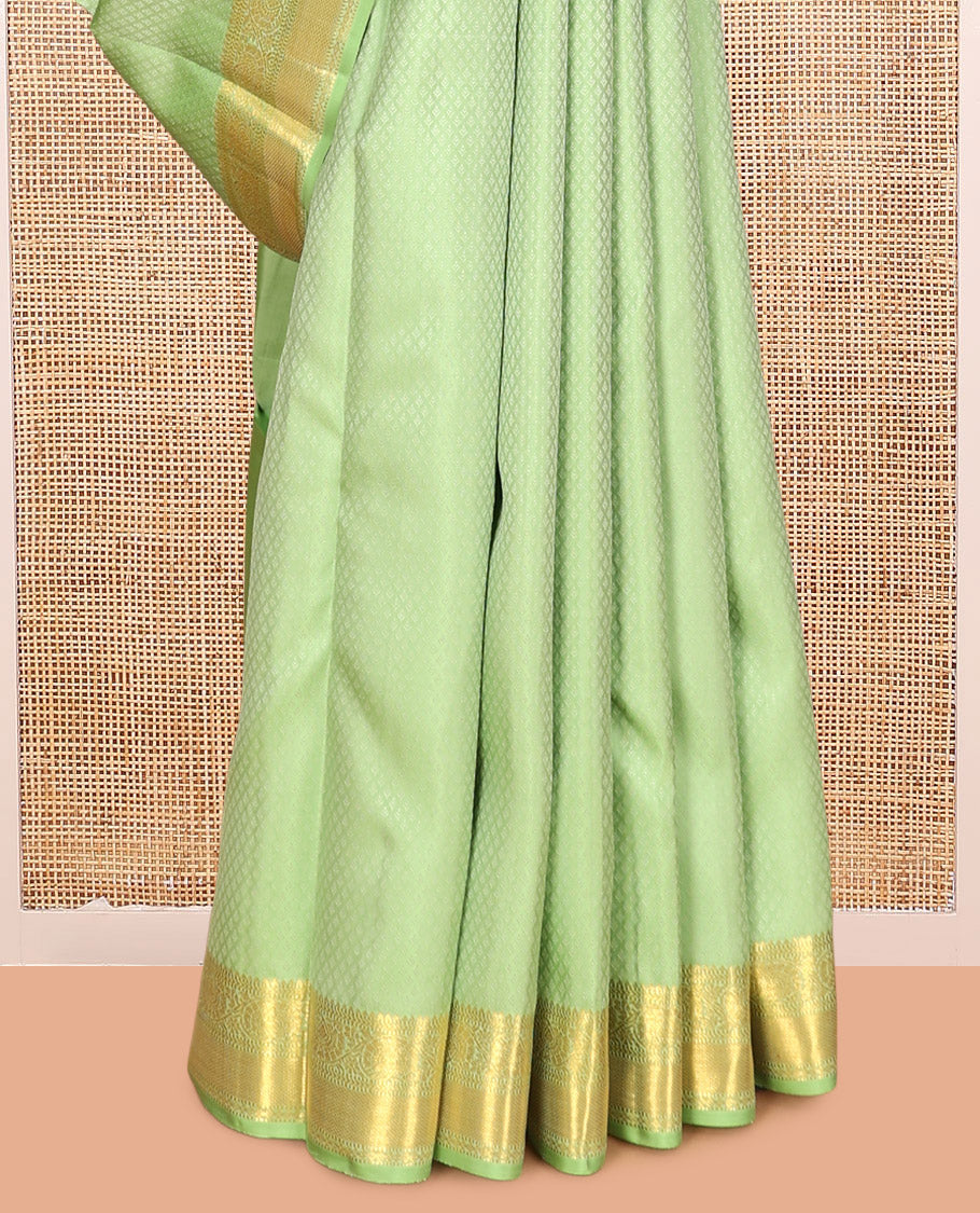Green Embossed Parambara Silk Saree, Adorned with Zari Border of Rekku, Muthu, Kathir, Kuyil Kann, and Kodi Visiry Designs, Pallu of Mayil Kann, and Matching Blouse
