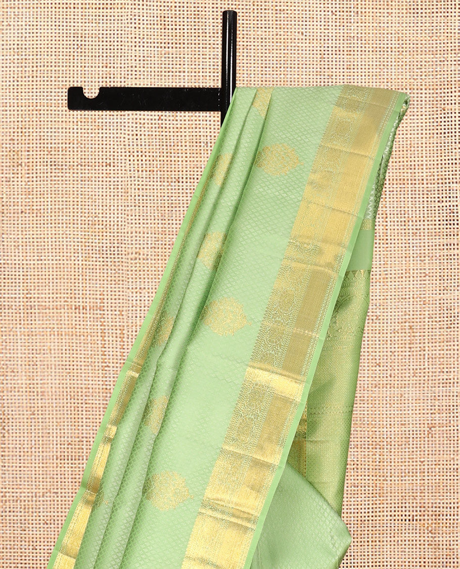 Green Embossed Parambara Silk Saree, Adorned with Zari Border of Rekku, Muthu, Kathir, Kuyil Kann, and Kodi Visiry Designs, Pallu of Mayil Kann, and Matching Blouse