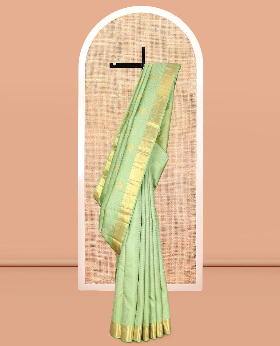 Green Embossed Parambara Silk Saree, Adorned with Zari Border of Rekku, Muthu, Kathir, Kuyil Kann, and Kodi Visiry Designs, Pallu of Mayil Kann, and Matching Blouse