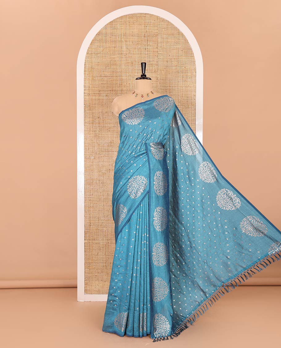 Light blue plus buttas woven Vichitra silk saree, kalpavriksha tree motifs woven on its border, self-pallu, and no blouse