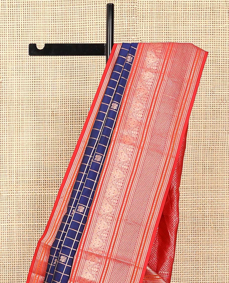 Blue zari checked with annam chakram buttas silk saree, contrast border of thilakam mokku, iruthalai pakshi, and ara maadam designs, and jaal pallu