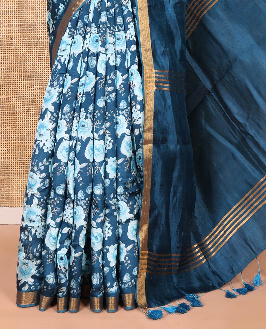 Blue floral motifs digital printed banana pith saree, zari piping border, striped pallu, and a matching floral printed blouse