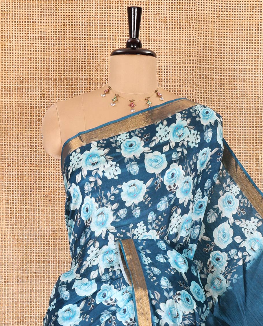 Blue floral motifs digital printed banana pith saree, zari piping border, striped pallu, and a matching floral printed blouse