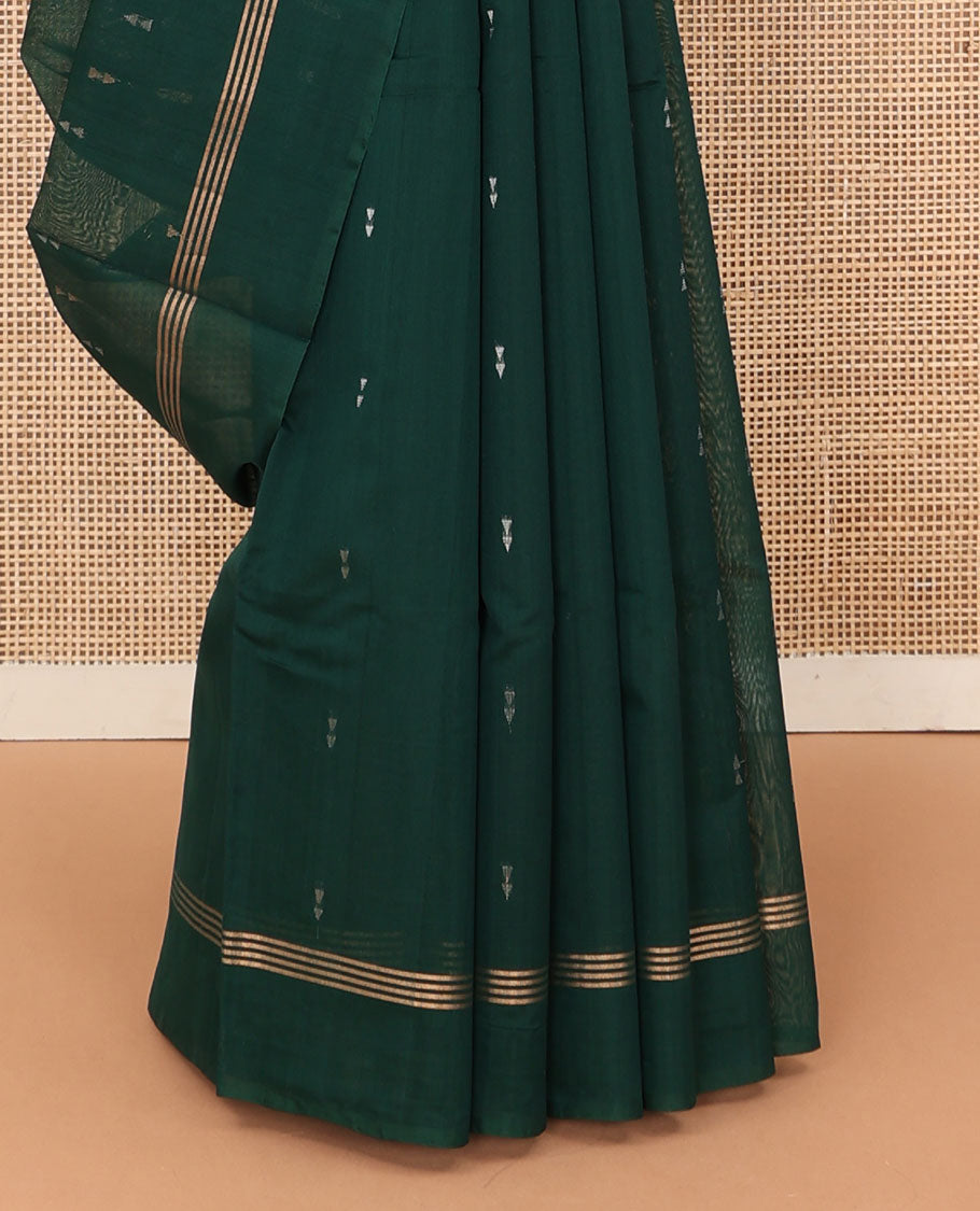 Green zari buttas silk cotton saree, zari striped border, and pallu of zari-rich geometric patterns