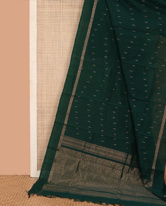 Green zari buttas silk cotton saree, zari striped border, and pallu of zari-rich geometric patterns